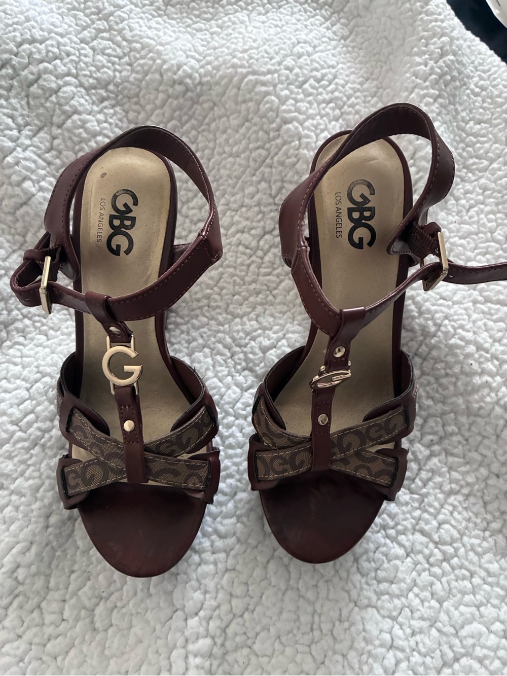 GBG Los Angeles Brown T-Strap Heels with Monogram Bow